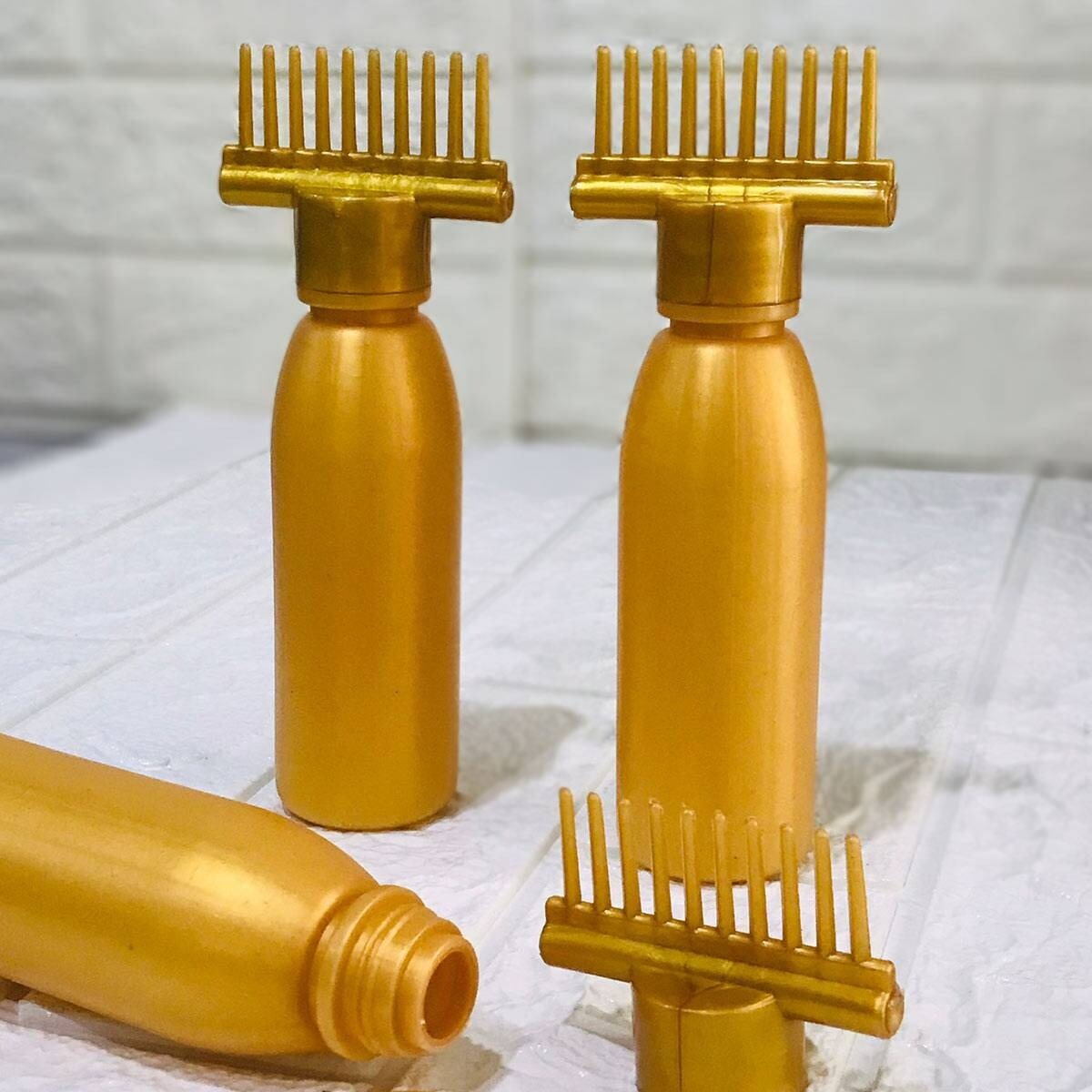 2 pc oil bottle with comb for hair